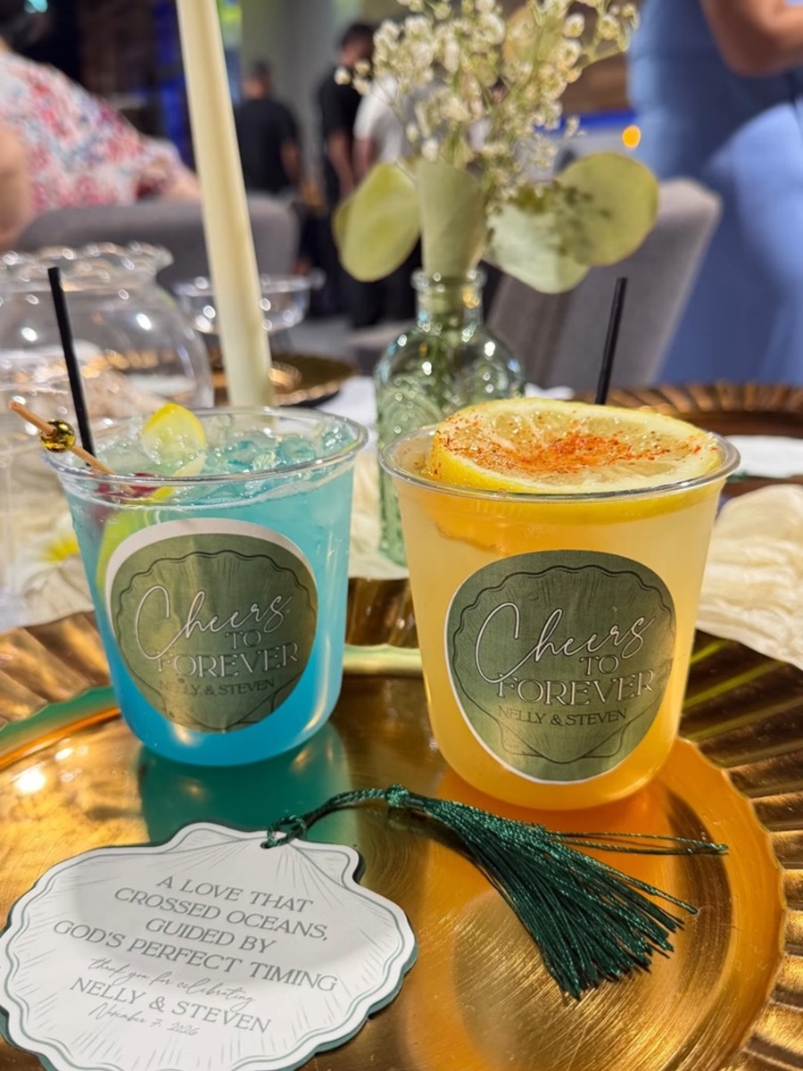 Custom blue and yellow wedding mocktails on a gold tray